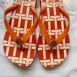 Tory Burch rubber Flip Flops in Orange sz 7